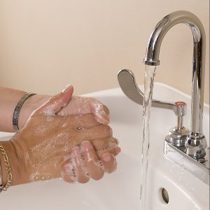 16295-hands-being-washed-in-a-sink-pv